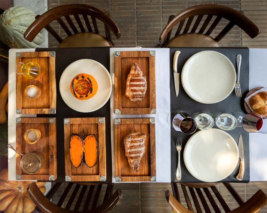 Asado Experience at Parrilla Don Julio - The Opening Courses: Chorizo and Provoleta
