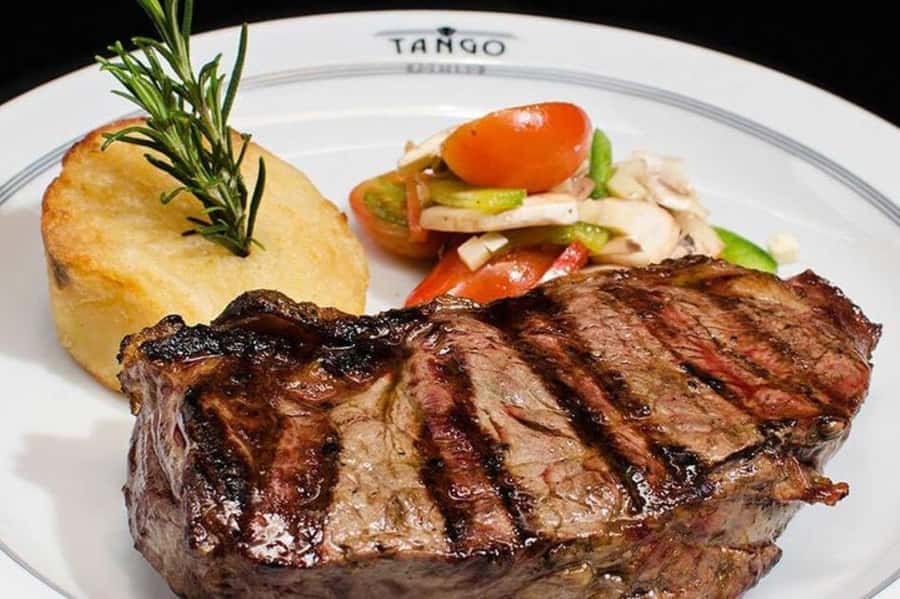 Buenos Aires: Tango Porteño Show Ticket with Dinner Option - Choosing between empanadas and the three-course dinner
