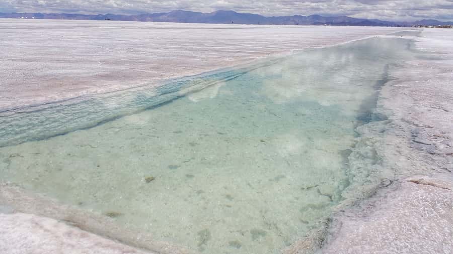 From Jujuy: Salinas Grandes, Purmamarca & Los Colorados Hike - Salinas Grandes and the blue volcanoes