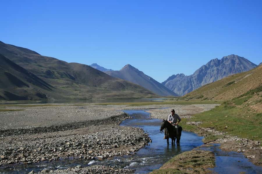 From Mendoza: Sunset Horseback Ride and Asado in the Andes - Riding through the Andes at sunset