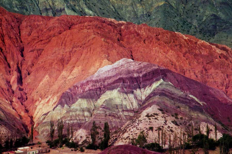 Humahuaca Valley Multicultural Tour from Salta - Volcán marks the entrance to the ravine